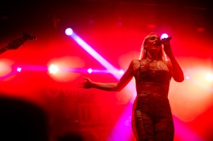 Ines Erbus performing with band at local student party.